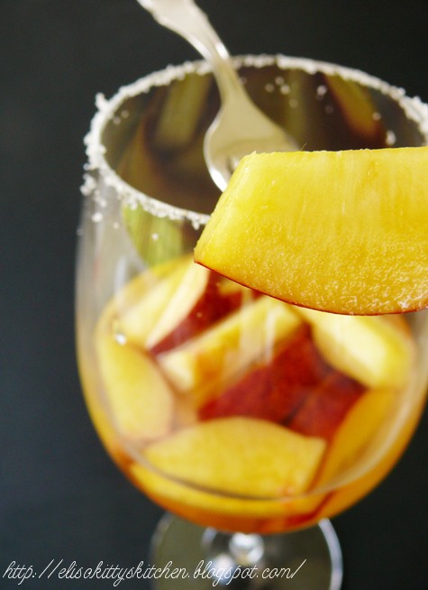 Pesche al vino