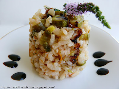 Risottino tiepido con verdure, arancia e fiori di menta