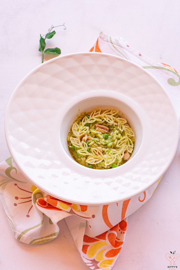 risotto alla crema di piselli con ragù di coniglio