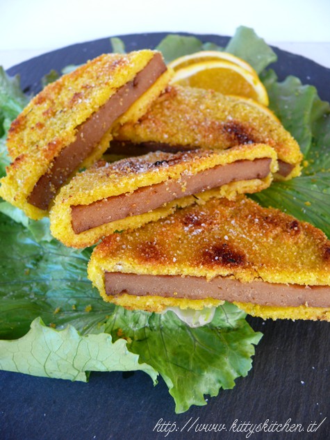 Seitan in crosta di mais e arancia